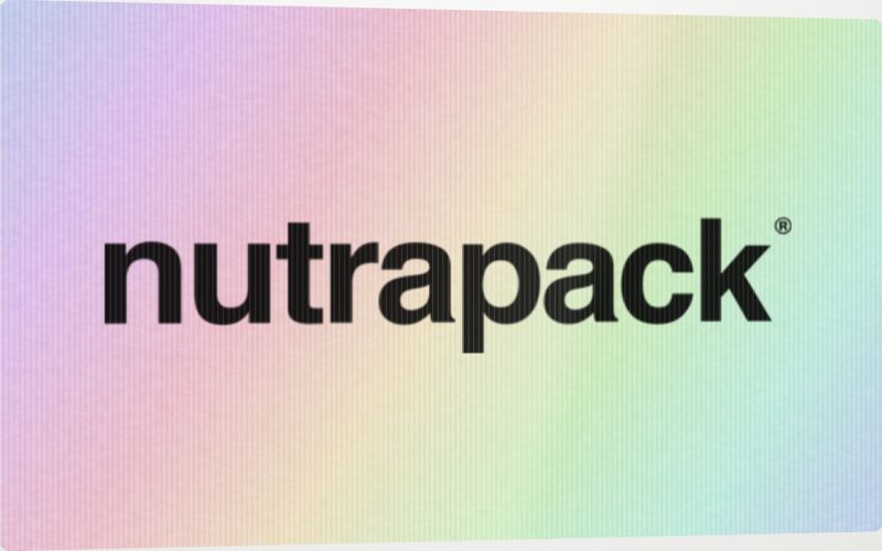 Flip label sample. One label, two images: the narwhal from one angle, the NutraPack wordmark from the other.
