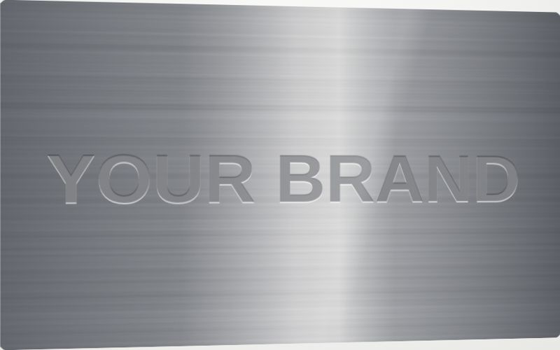 Metallic cold foil label sample. A mirror-bright metallic finish printed inline, with a highlight that moves as the pack turns.