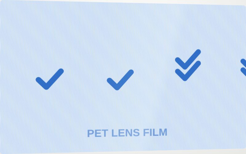 Micro-optic array, PET film label sample. Tiny lenses make floating images that move against the tilt.